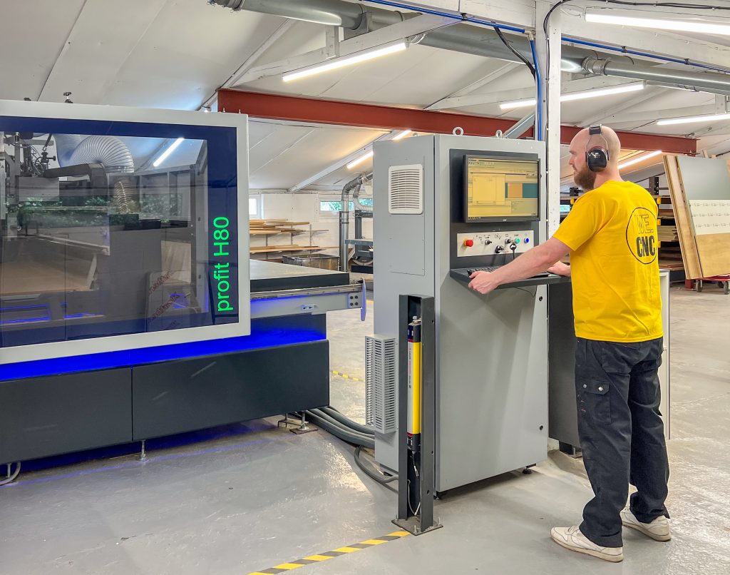 CNC machinist running a programme on the Feldr CNC in the workshop
